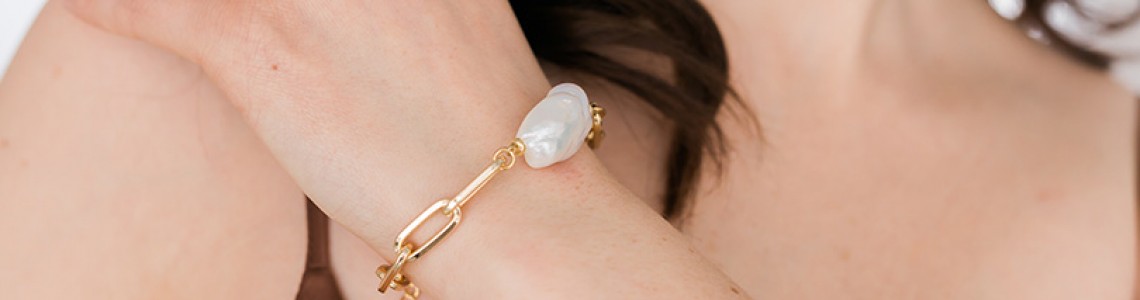 From Minimal To Stacking: Style a Dainty Pearl Bracelet On Any Looks